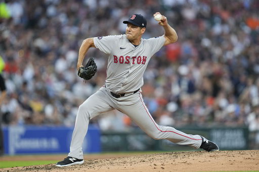 FILE - Boston Red Sox pitcher Rich Hill throws against the Detroit Tigers in the seventh inning of a baseball game