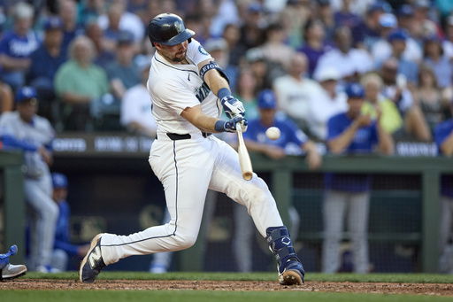 Seattle Mariners' Cal Raleigh hits a solo home run off Kansas City Royals pitcher Daniel Lynch IV during the seventh inning of a baseball game Monday