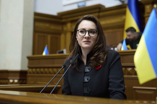 FILE - Vice Prime Minister and Minister of Economy of Ukraine Yuliia Svyrydenko speaks in the Ukrainian Parliament in Kyiv