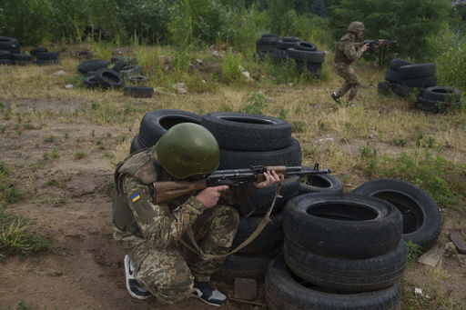 Ukrainian military recruits train at the polygon in the Kyiv region