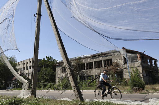 In this photo provided by Ukraine's 65th Mechanized Brigade press service