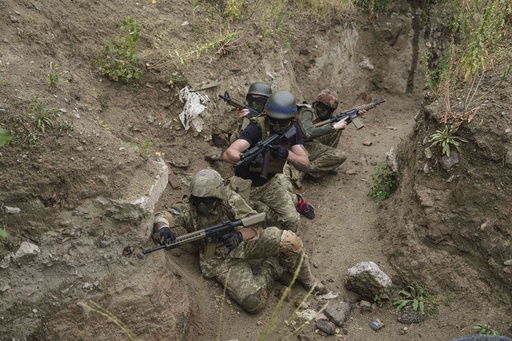 Ukrainian 3rd Assault Brigade recruits train at the polygon in Kyiv region