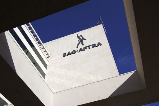 FILE - SAG-AFTRA signage is seen on the side of the headquarters in Los Angeles on Friday