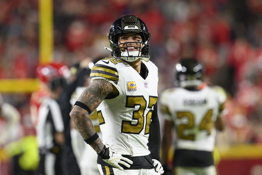 FILE - New Orleans Saints safety Tyrann Mathieu looks to the scoreboard during the second half of an NFL football game against the Kansas City Chiefs
