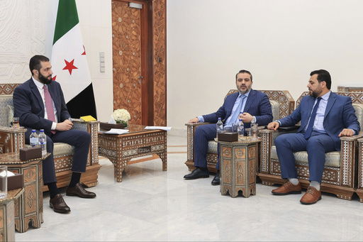 In this photo released by the Syrian official news agency SANA