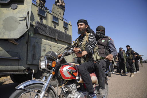 Two fighters from the Sunni Bedouin clans
