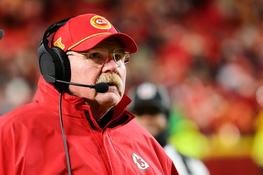 FILE - Kansas City Chiefs head coach Andy Reid looks at the scoreboard during a break in action against the Houston Texans during the second half of an NFL football divisional playoff game