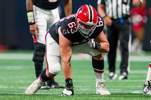 FILE - Atlanta Falcons guard Chris Lindstrom (63) lines up during the first half of an NFL football game against the New York Giants