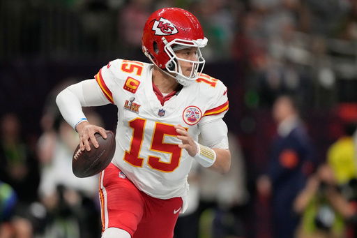 FILE - Kansas City Chiefs quarterback Patrick Mahomes looks to throw against the Philadelphia Eagles during the first half of the NFL Super Bowl 59 football game