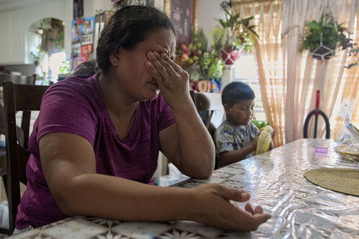 Maria sobs as she recounts how scared and anxious she is for her children