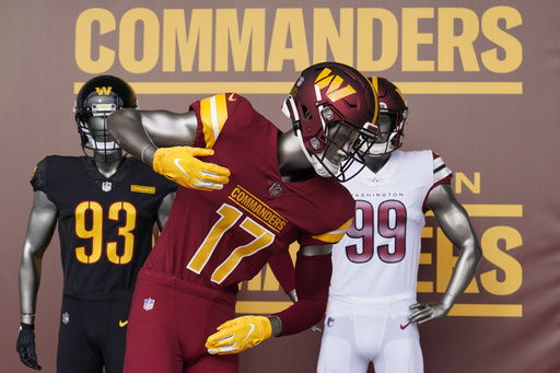 FILE - Washington Commanders jerseys are displayed at an event to unveil the NFL football team's new identity