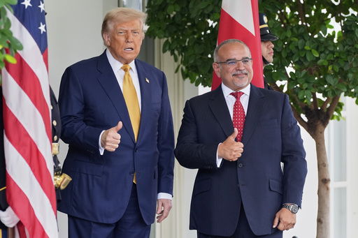 President Donald Trump greets Bahrain's Crown Prince Salman bin Hamad Al Khalifa at the White House