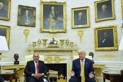 President Donald Trump and Bahrain's Crown Prince Salman bin Hamad Al Khalifa speak in the Oval Office of the White House
