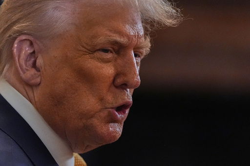 President Donald Trump speaks during a reception for Republican members of Congress in the East Room of the White House