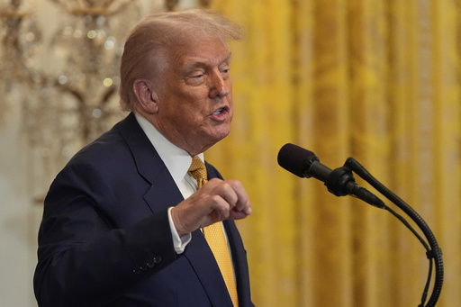 President Donald Trump speaks during a reception for Republican members of Congress in the East Room of the White House