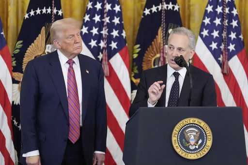 White House AI and crypto czar David Sacks speaks as President Donald Trump listens at an event for the signing of the GENIUS Act