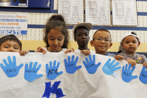 LASOS summer campers hold up an art project at Bel Air High School in Bel Air