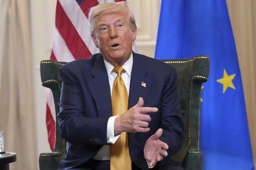 President Donald Trump gestures as he meets European Commission President Ursula von der Leyen at the Trump Turnberry golf course in Turnberry