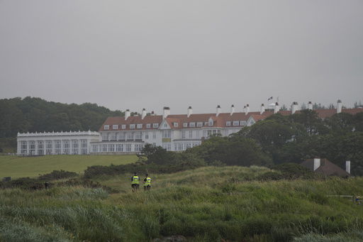 Police guard the Trump Turnberry golf course in Turnberry