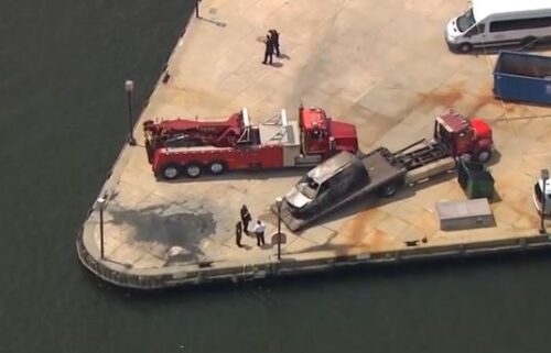 A van that was pulled out of the Inner Harbor on Thursday had likely been submerged underwater for years