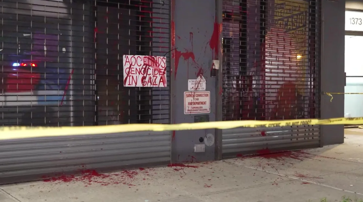<i>WCBS via CNN Newsource</i><br/>Rep. Alexandria Ocasio-Cortez's office was vandalized with red paint overnight in New York City.