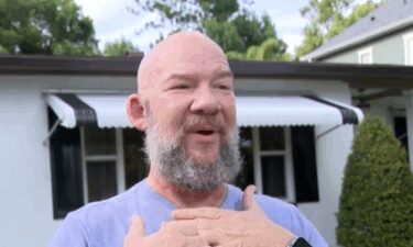 Mark Sunderland says a downed line on an Orlando Street wrapped around his neck and pulled him off his Vespa.