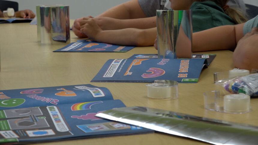 Kids at camp invention work on optical illusions