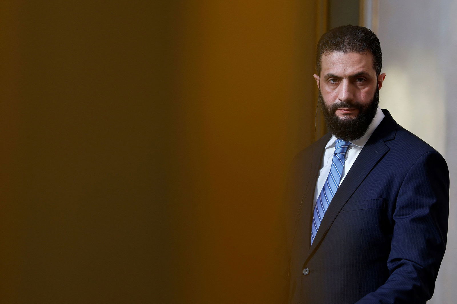 <i>Stephanie Lecocq/Pool/Reuters via CNN Newsource</i><br/>Syrian President Ahmed al-Sharaa attends a joint press conference iwth French President Emmanuel Macron after a meeting at the Elysee Palace in Paris on May 7.