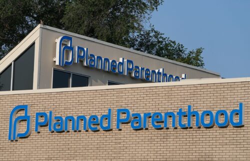 A Planned Parenthood sign is displayed on the outside of the clinic in Indianapolis in August 2023. Planned Parenthood is suing the Trump administration over the “big beautiful bill.”