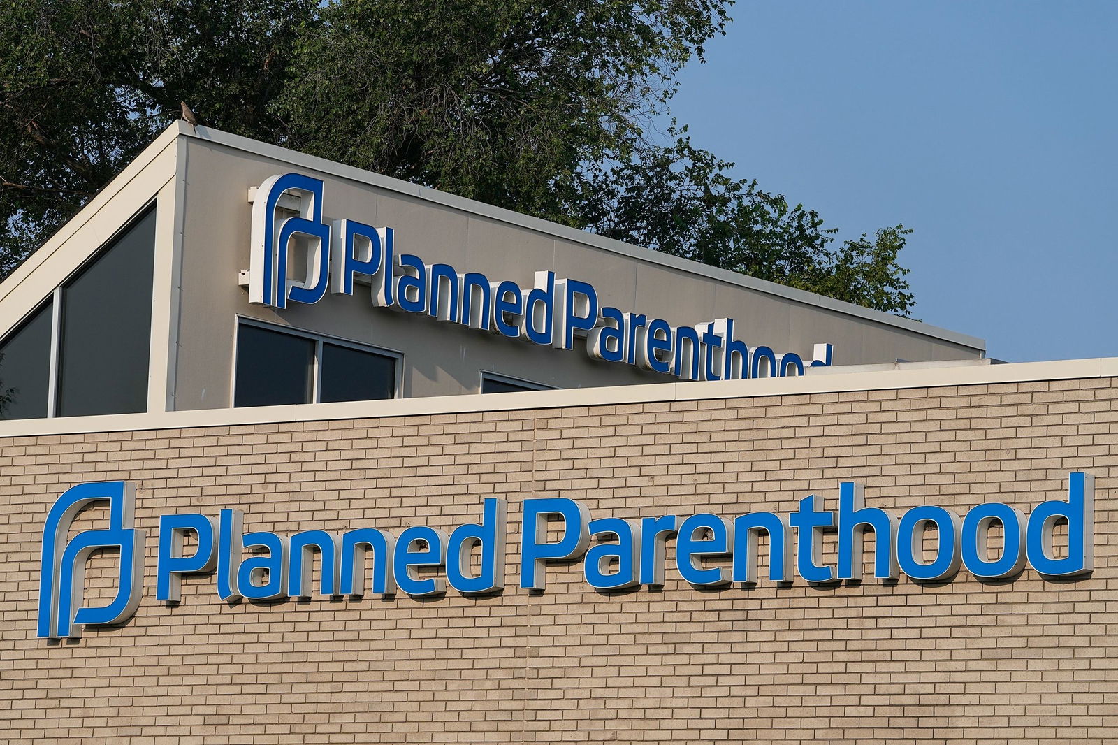 <i>Darron Cummings/AP/File via CNN Newsource</i><br/>A Planned Parenthood sign is displayed on the outside of the clinic in Indianapolis in August 2023. Planned Parenthood is suing the Trump administration over the “big beautiful bill.”