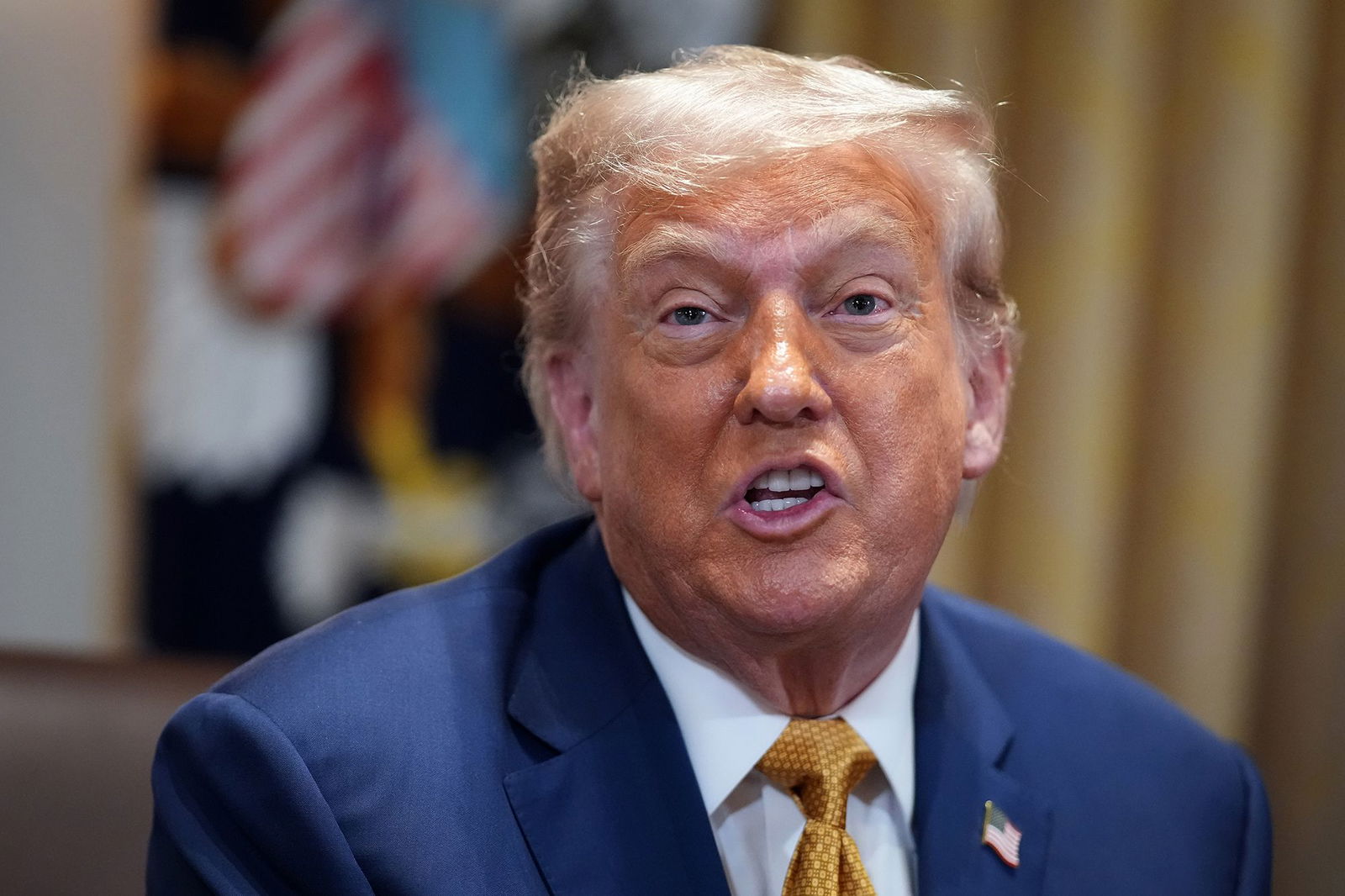 <i>Andrew Harnik/Getty Images via CNN Newsource</i><br/>President Donald Trump speaks to members of the press during a Cabinet Meeting at the White House on July 8.
