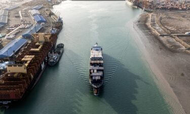 This aerial view shows a container ship cruising at the port of Umm Qasr in Iraq's southern city of Basra. Iraq was among the latest countries to receive a letter from President Donald Trump informing the nation of the rate its goods will be tariffed as of August 1