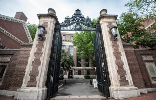 A Harvard University gate opens May 24 to campus in Cambridge