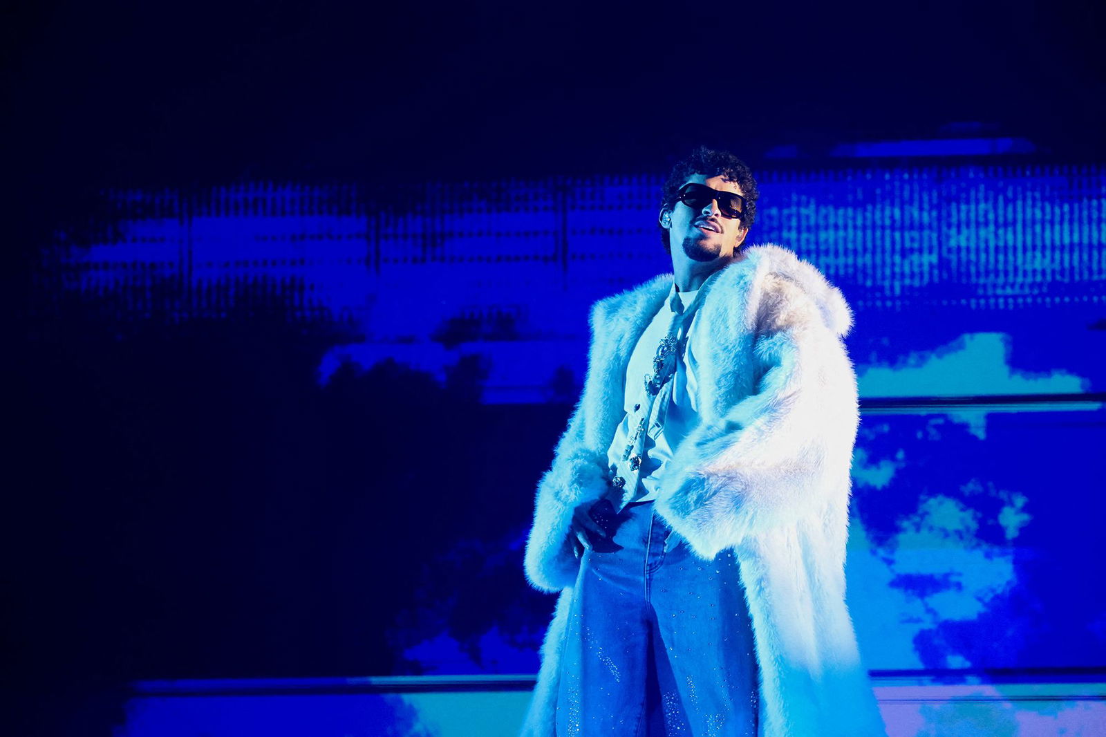 <i>Mario Anzuoni/Reuters via CNN Newsource</i><br/>Bad Bunny performs in March at the iHeartRadio Music Awards in Los Angeles. His residency in Puerto Rico begins Friday.
