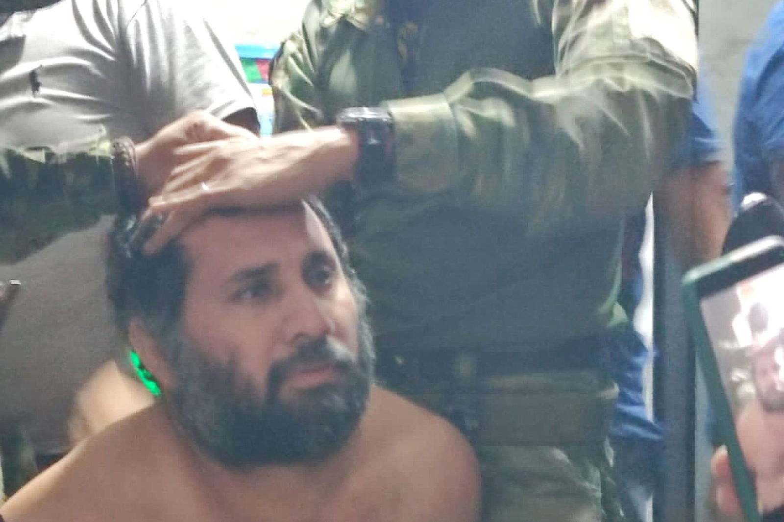 <i>Karen Toro/Reuters via CNN Newsource</i><br/>Security forces stand outside the National Court of Justice following a hearing for the extradition of Ecuadorean gang leader Jose Adolfo Macías