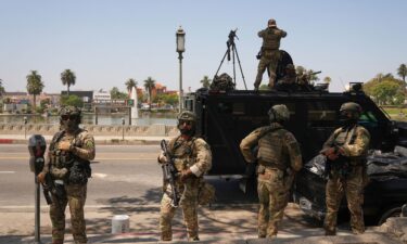 Federal agents stage at MacArthur Park in Los Angeles on July 7
