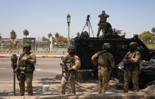 Federal agents stage at MacArthur Park in Los Angeles on July 7