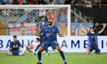 Al-Hilal midfielder Khalid Al-Ghannam celebrates defeating Manchester City.