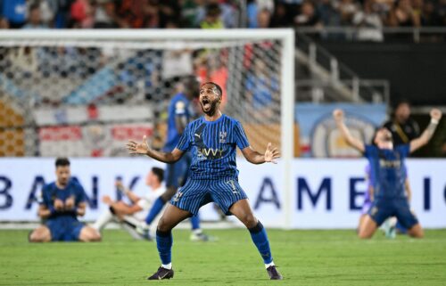 Al-Hilal midfielder Khalid Al-Ghannam celebrates defeating Manchester City.