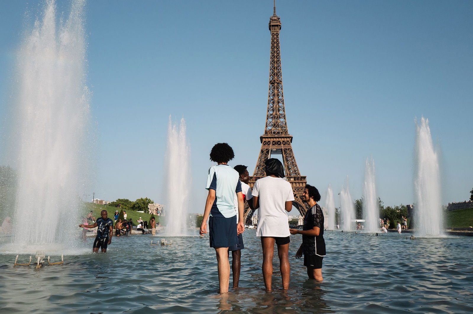 <i>Jerome Gilles/NurPhoto/Getty Images via CNN Newsource</i><br/>Parisians and tourists cool off at the Trocadero fountain in Paris