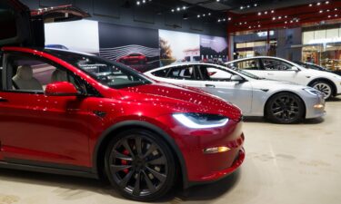 New Tesla vehicles are displayed at a showroom in San Diego. The automaker reported another sharp drop in sales for the second quarter compared to a year ago.