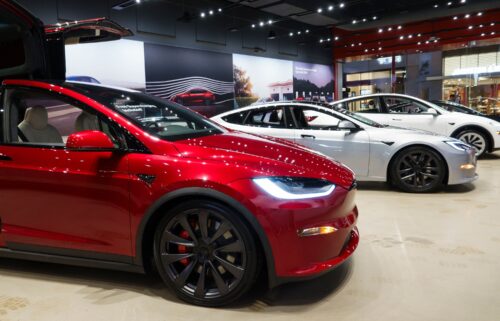 New Tesla vehicles are displayed at a showroom in San Diego. The automaker reported another sharp drop in sales for the second quarter compared to a year ago.