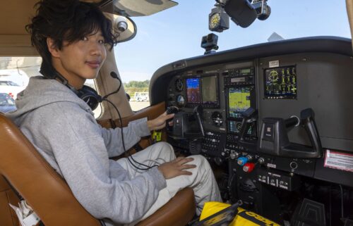 The plane flown by Ethan Guo is seen landing in Antarctica.