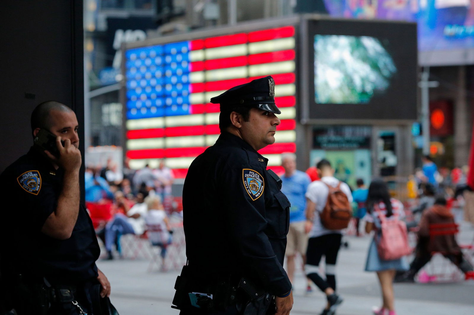 <i>Eduardo Munoz Alvarez/Getty Images via CNN Newsource</i><br/>New York Police Department officers stand guard at Times Square in New York on July 4