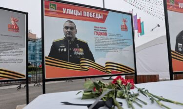 Flowers placed in front of a photograph of Maj. Gen. Mikhail Gudkov