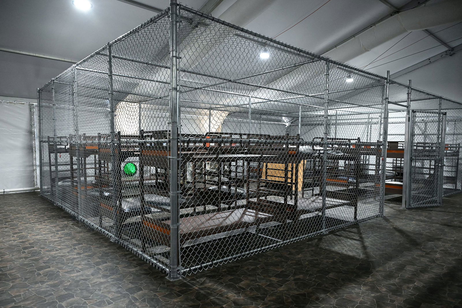 <i>Andrew Caballero-Reynolds/AFP/Getty Images via CNN Newsource</i><br/>Beds are seen inside the migrant detention center dubbed as