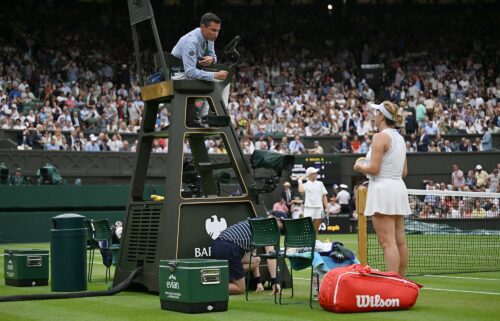 Anastasia Pavlyuchenkova (right) speaks to umpire Nico Helwerth during her match against Sonay Kartal.