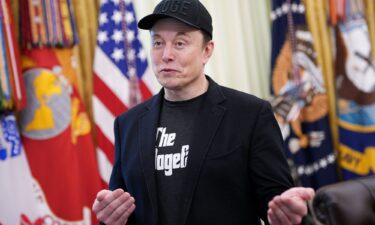 Tesla CEO Elon Musk speaks to reporters alongside President Donald Trump in the Oval Office of the White House in May 2025 in Washington