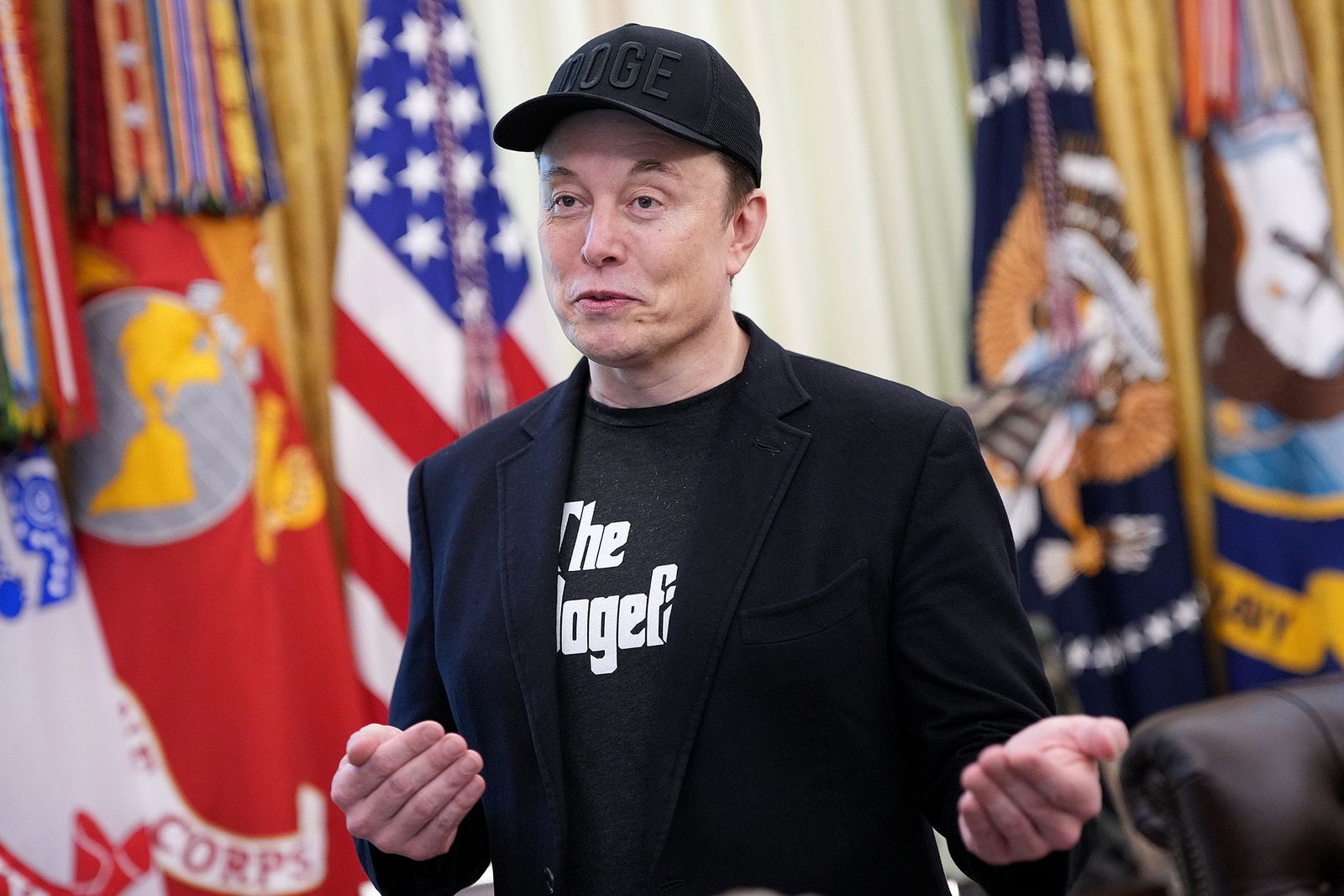 <i>Kevin Dietsch/Getty Images via CNN Newsource</i><br/>Tesla CEO Elon Musk speaks to reporters alongside President Donald Trump in the Oval Office of the White House in May 2025 in Washington