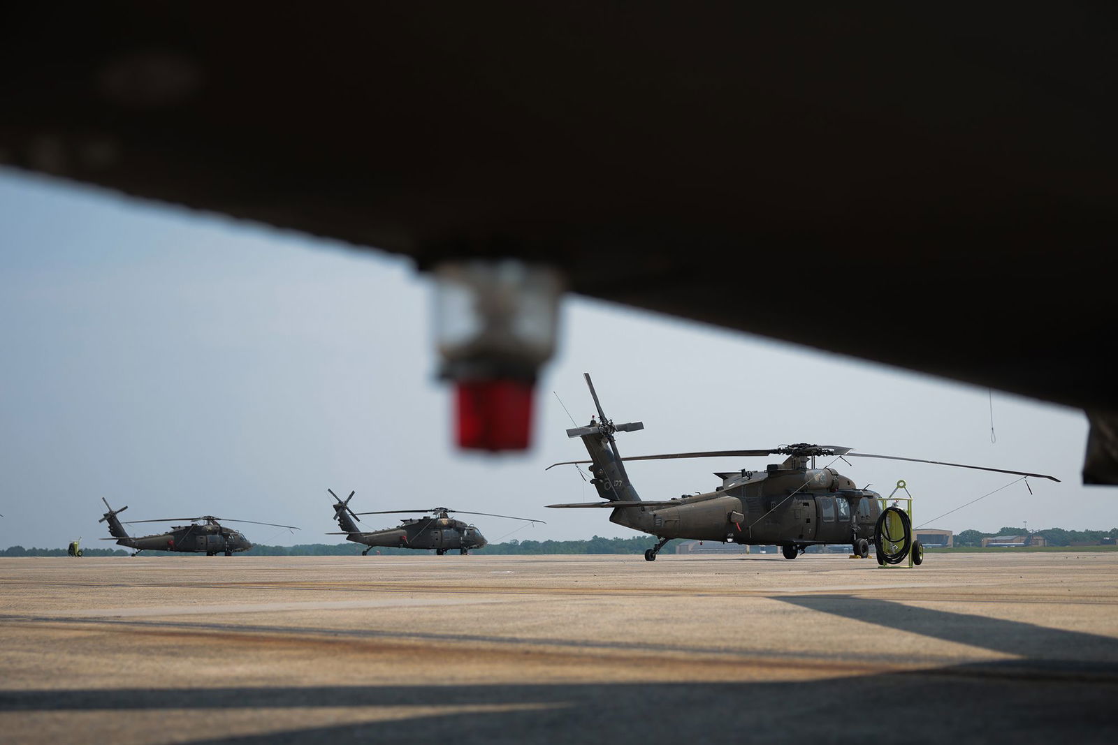 <i>Kayla Bartkowski/Getty Images via CNN Newsource</i><br/>U.S. Army UH-60M Black Hawk helicopters are seen parked near Washington